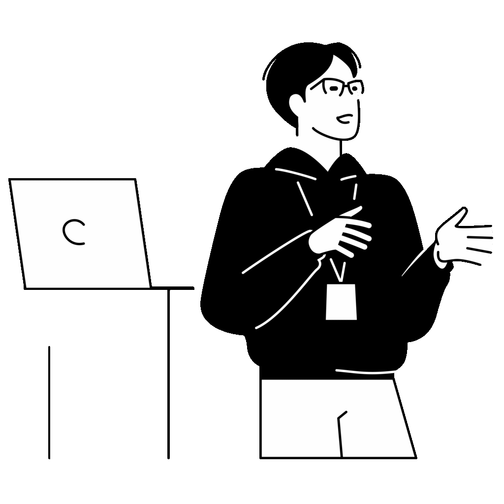 PowerPoint: ilustracja prezentera przy stoliku z laptopem, gestykulującego podczas wystąpienia